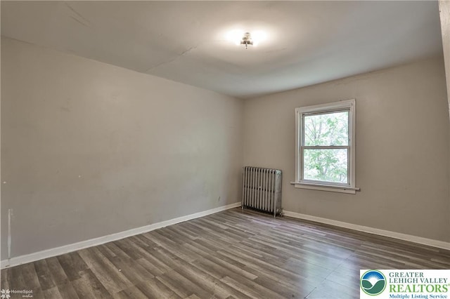209 Cattell St, Easton, PA 18042 - spare room featuring radiator and dark wood finished floors
