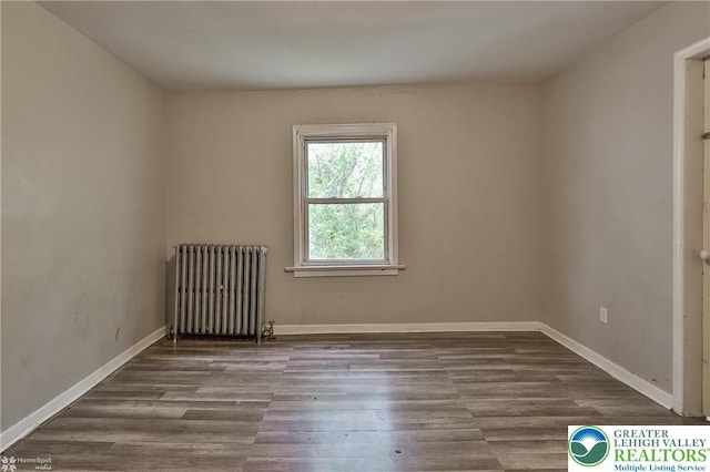 209 Cattell St, Easton, PA 18042 - empty room featuring radiator and wood finished floors
