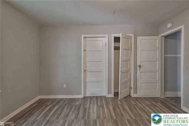 209 Cattell St, Easton, PA 18042 - unfurnished bedroom featuring wood finished floors and a closet