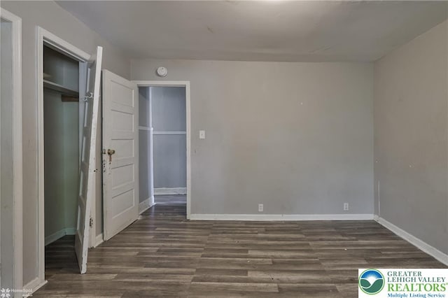 209 Cattell St, Easton, PA 18042 - unfurnished bedroom with dark wood finished floors and a closet