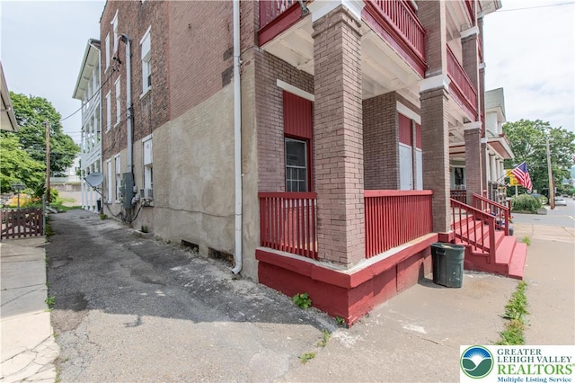 409 Broad St Unit 409, Tamaqua Boro, PA 18252 - view of property exterior with brick siding