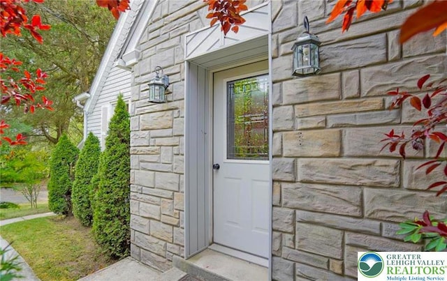 717 Claremont Ave, Schuylkill, PA 18252 - property entrance with stone siding