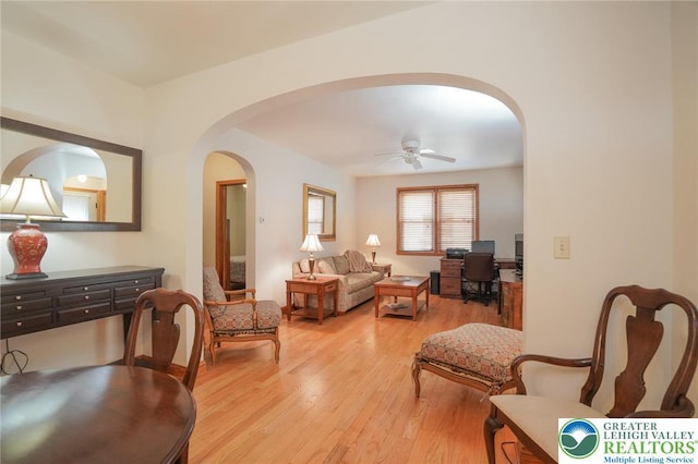 717 Claremont Ave, Schuylkill, PA 18252 - living room with a ceiling fan, light wood-type flooring, arched walkways, and a desk