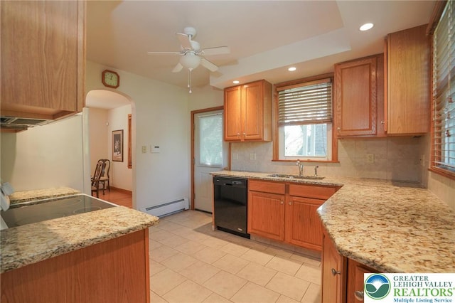 717 Claremont Ave, Schuylkill, PA 18252 - kitchen featuring black dishwasher, a baseboard radiator, decorative backsplash, ceiling fan, and arched walkways