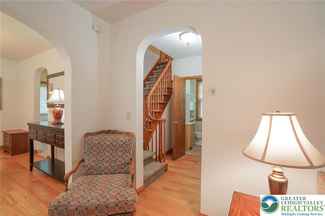 717 Claremont Ave, Schuylkill, PA 18252 - corridor featuring wood finished floors, stairs, and arched walkways