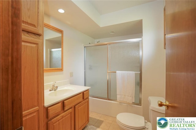 717 Claremont Ave, Schuylkill, PA 18252 - bathroom with vanity, tile patterned flooring, enclosed tub / shower combo, and recessed lighting