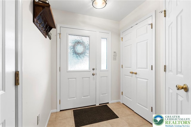 8067 Heritage Dr, Lower Macungie Twp, PA 18011 - entryway with light tile patterned floors