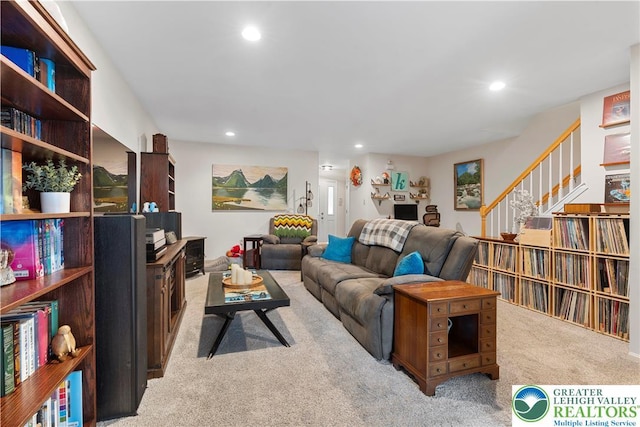 8067 Heritage Dr, Lower Macungie Twp, PA 18011 - living area featuring recessed lighting, carpet flooring, and stairway