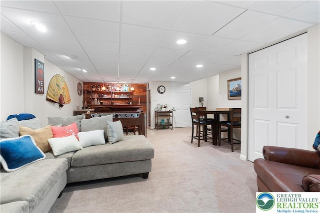8067 Heritage Dr, Lower Macungie Twp, PA 18011 - living room with a bar, light colored carpet, recessed lighting, and a paneled ceiling