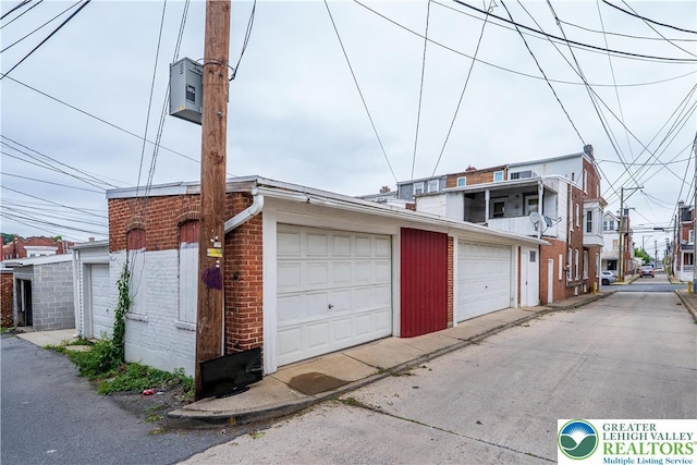 638 N 16th St, Allentown City, PA 18102 - view of home's exterior featuring brick siding and an outbuilding