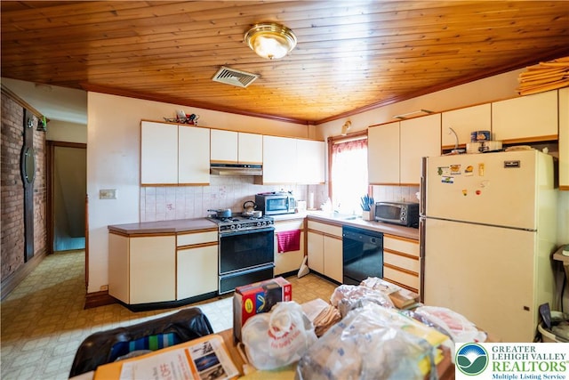 638 N 16th St, Allentown City, PA 18102 - kitchen with black dishwasher, freestanding refrigerator, gas range oven, stainless steel microwave, and under cabinet range hood