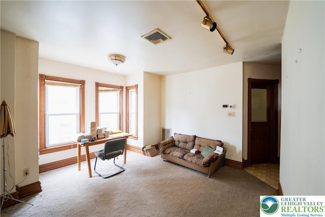 638 N 16th St, Allentown City, PA 18102 - carpeted living room featuring an office area and baseboards