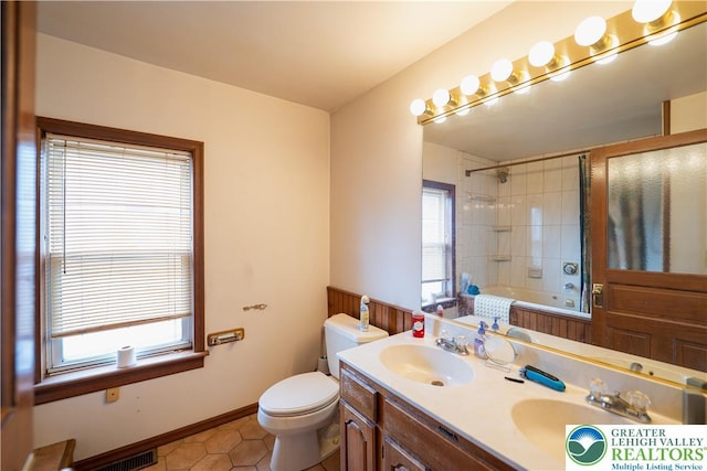 638 N 16th St, Allentown City, PA 18102 - bathroom featuring double vanity, bathtub / shower combination, and tile patterned flooring