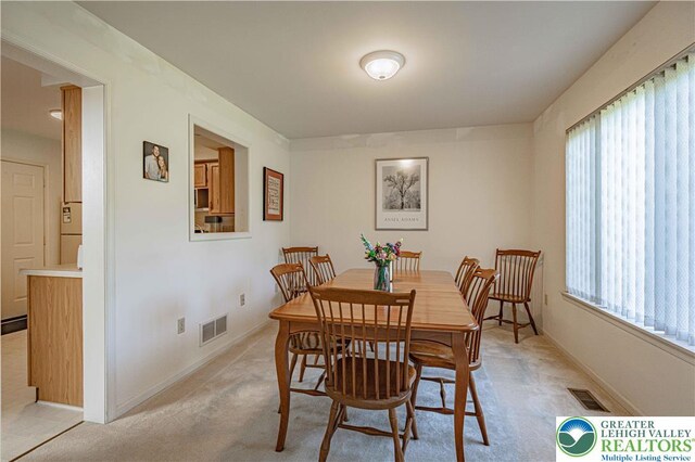 21 Winfield Ct, Easton, PA 18045 - dining room with plenty of natural light and light carpet