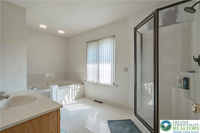21 Winfield Ct, Easton, PA 18045 - full bath featuring a shower stall, a garden tub, vanity, and tile patterned floors