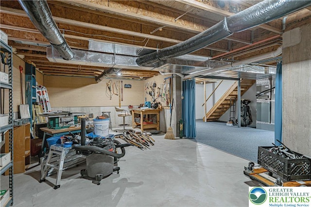 21 Winfield Ct, Easton, PA 18045 - unfinished basement with a workshop area and stairs