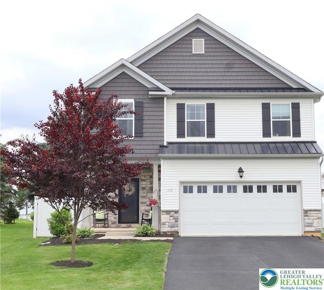 330 Bendelow Ln, Northampton Boro, PA 18067 - view of front of property with a standing seam roof, stone siding, asphalt driveway, a front lawn, and a garage