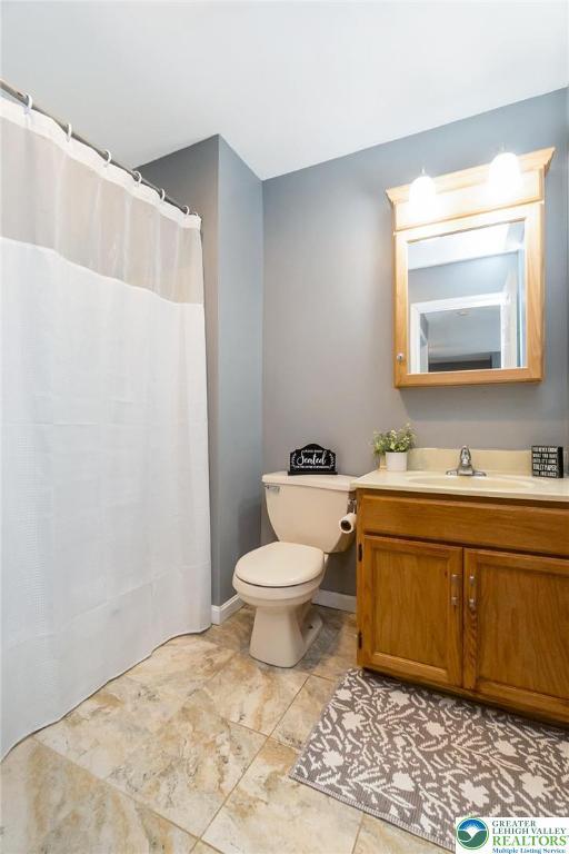 104 Stephanie Dr, Palmer Twp, PA 18045 - bathroom with vanity and a shower with shower curtain