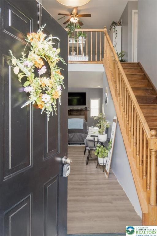 104 Stephanie Dr, Palmer Twp, PA 18045 - foyer entrance featuring stairs, wood finished floors, and ceiling fan