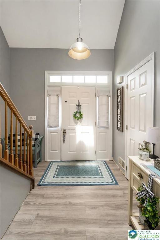 104 Stephanie Dr, Palmer Twp, PA 18045 - entryway featuring light wood-style flooring and stairs