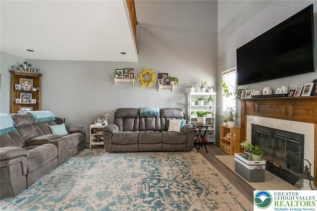 104 Stephanie Dr, Palmer Twp, PA 18045 - living area with a tile fireplace and wood finished floors