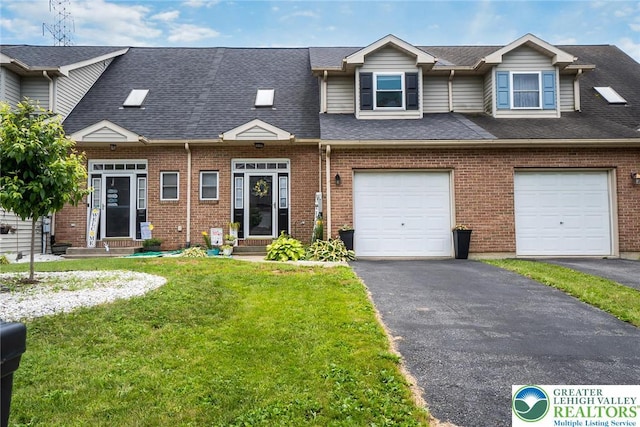 104 Stephanie Dr, Palmer Twp, PA 18045 - multi unit property featuring a front yard, brick siding, driveway, and a shingled roof