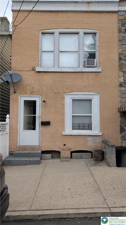 1137 Mechanic St, Bethlehem City, PA 18015 - view of exterior entry featuring brick siding