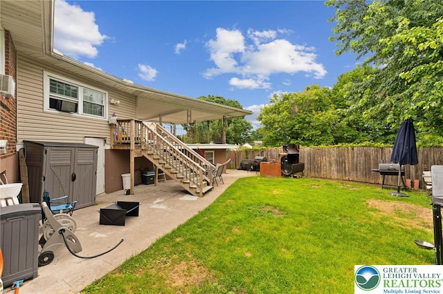 4116 Springmill Rd, Whitehall Twp, PA 18052 - fenced backyard featuring stairs, a patio area, a storage shed, and cooling unit
