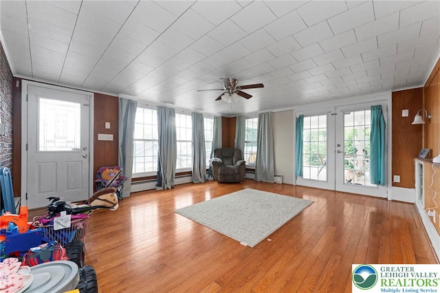 4116 Springmill Rd, Whitehall Twp, PA 18052 - living room with ceiling fan, light wood-type flooring, french doors, a baseboard heating unit, and wooden walls