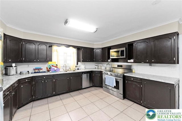 4116 Springmill Rd, Whitehall Twp, PA 18052 - kitchen with appliances with stainless steel finishes, ornamental molding, decorative backsplash, and light tile patterned floors