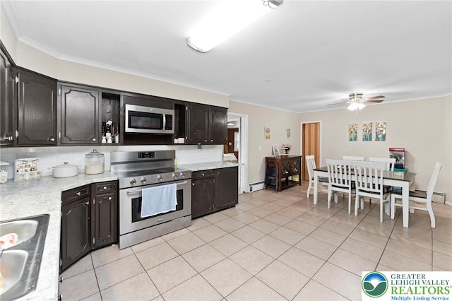 4116 Springmill Rd, Whitehall Twp, PA 18052 - kitchen featuring stainless steel appliances, light tile patterned floors, light countertops, crown molding, and ceiling fan