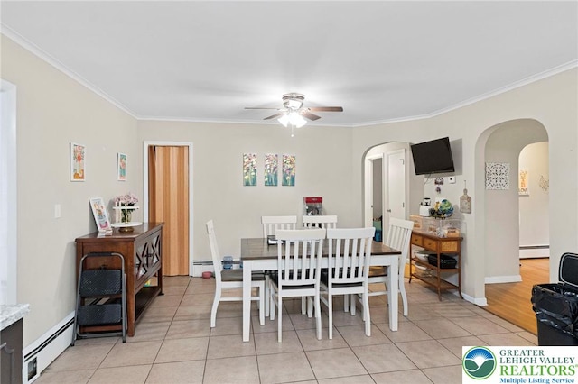 4116 Springmill Rd, Whitehall Twp, PA 18052 - dining space featuring a baseboard radiator, arched walkways, ceiling fan, ornamental molding, and light tile patterned flooring