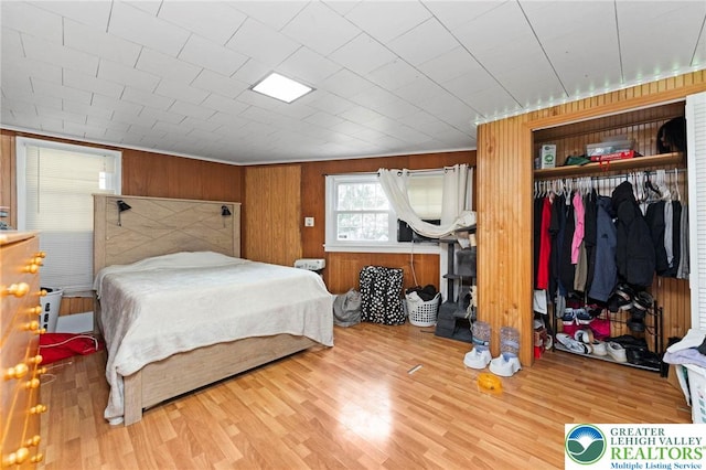 4116 Springmill Rd, Whitehall Twp, PA 18052 - bedroom featuring wood finished floors, a closet, and wooden walls