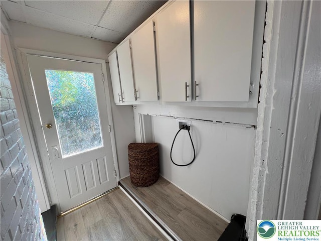 18 S Bradford St, Allentown City, PA 18109 - laundry area with cabinet space, washer hookup, and light wood finished floors