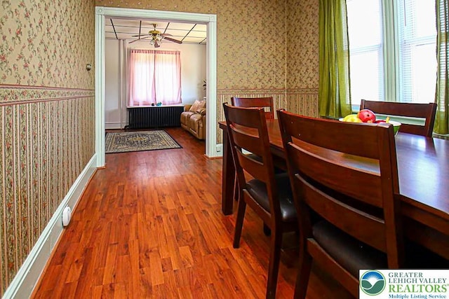 532 Broadway, Bangor Boro, PA 18013 - dining room featuring wallpapered walls, wood finished floors, radiator heating unit, and a ceiling fan