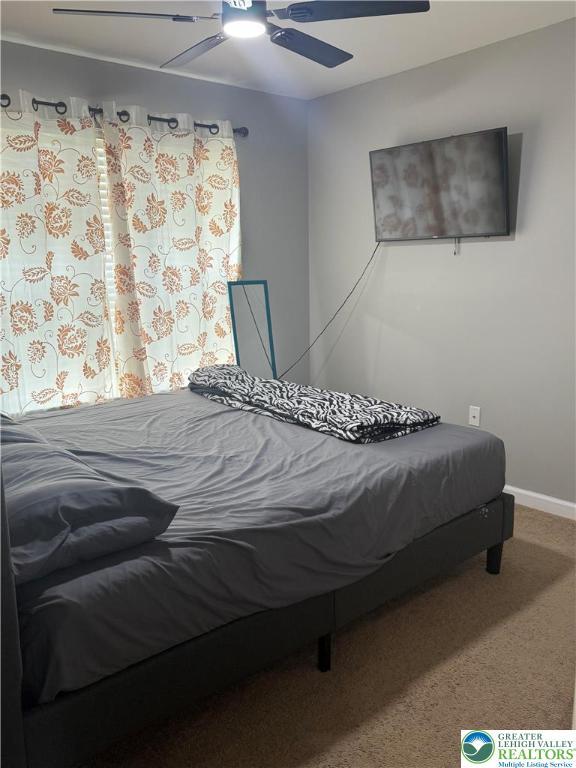 3563 Sweetgum Dr, Lower Nazareth Twp, PA 18064 - bedroom with a ceiling fan and carpet floors