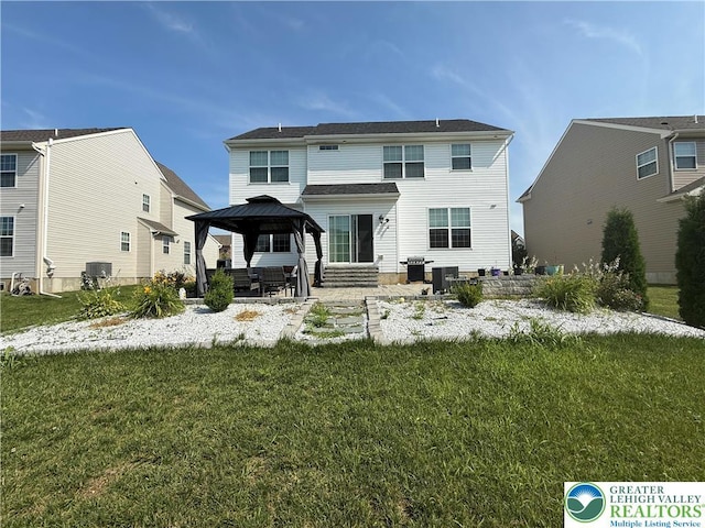 3563 Sweetgum Dr, Lower Nazareth Twp, PA 18064 - rear view of house with a gazebo, a lawn, a patio, and entry steps