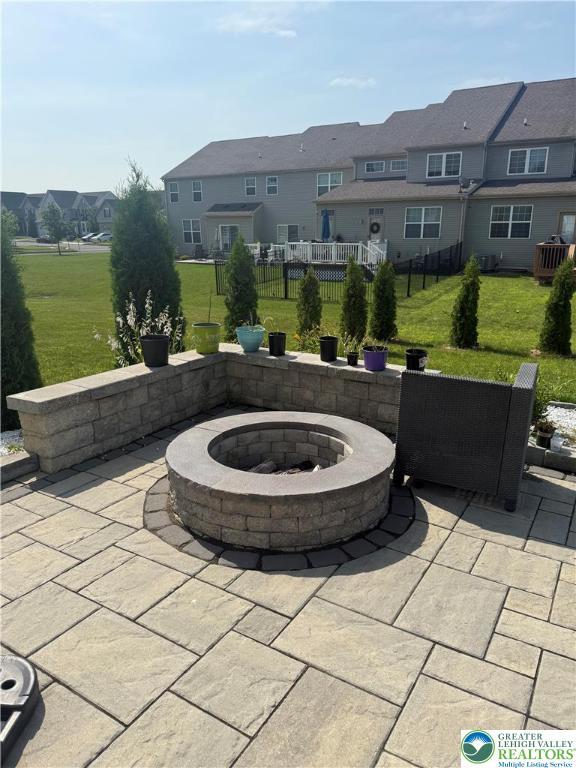 3563 Sweetgum Dr, Lower Nazareth Twp, PA 18064 - view of patio / terrace with an outdoor fire pit and a residential view