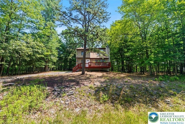 117 Manchester Dr, Lehman Twp, PA 18324 - view of yard featuring a wooden deck