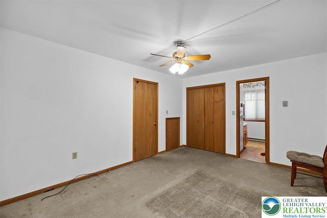 117 Manchester Dr, Lehman Twp, PA 18324 - unfurnished bedroom with carpet and ceiling fan