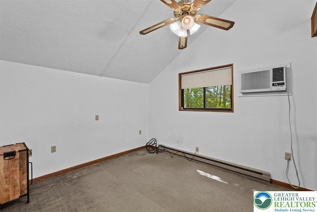 117 Manchester Dr, Lehman Twp, PA 18324 - bonus room featuring a baseboard heating unit, lofted ceiling, a wall mounted AC, carpet flooring, and a ceiling fan