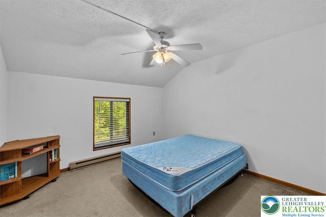 117 Manchester Dr, Lehman Twp, PA 18324 - bedroom with baseboard heating, vaulted ceiling, carpet, a textured ceiling, and ceiling fan