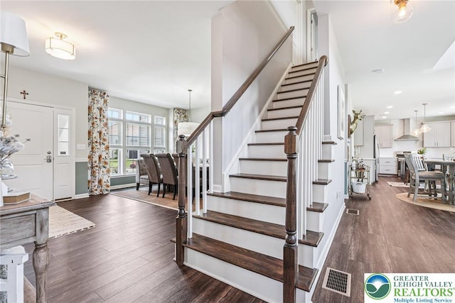 3334 Coventry Dr, Lower Macungie Twp, PA 18062 - entryway with stairway, dark wood-style flooring, and recessed lighting