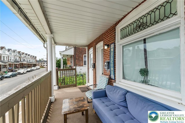1002 S 6th St, Allentown City, PA 18103 - covered porch featuring a residential view