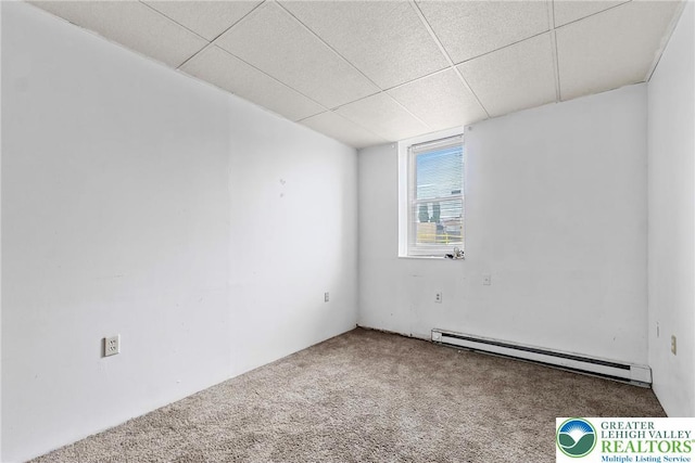 1002 S 6th St, Allentown City, PA 18103 - carpeted empty room featuring a baseboard radiator and a paneled ceiling