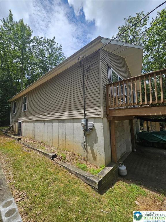 178 Sparrow Ln, Penn Forest Twp, PA 18229 - view of side of property featuring a deck