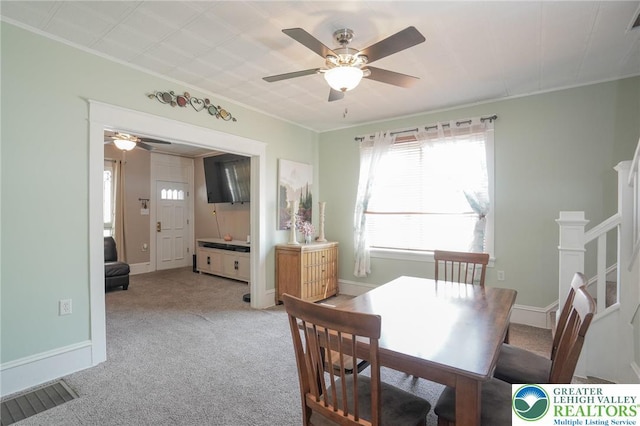 126 W High St, Coaldale Boro, PA 18218 - dining area with a ceiling fan, carpet, crown molding, and stairs