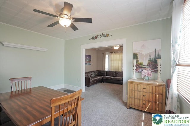 126 W High St, Coaldale Boro, PA 18218 - dining space with light colored carpet, a ceiling fan, and ornamental molding