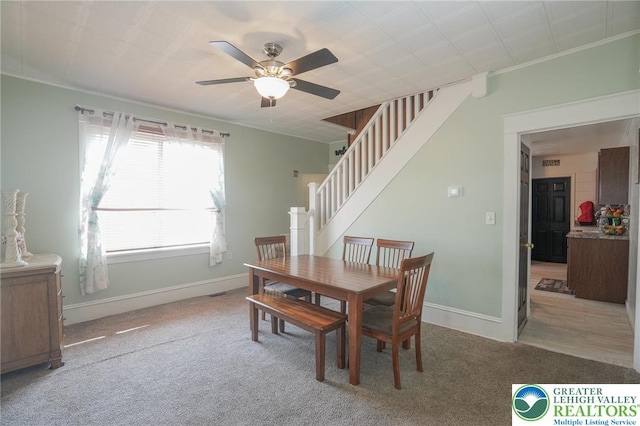 126 W High St, Coaldale Boro, PA 18218 - dining area featuring carpet floors, ceiling fan, ornamental molding, and stairs