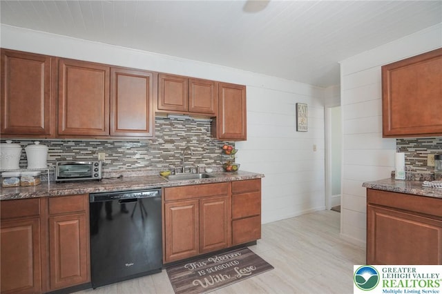 126 W High St, Coaldale Boro, PA 18218 - kitchen featuring black dishwasher, decorative backsplash, dark stone counters, and brown cabinets